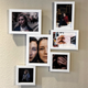 My slapdash gallery, with lovely stock photos inside. This entire thing is held up with nothing but magnets and a single 3M command picture hanging strip, but the outer frames were definitely pretty precarious. If I was installing it for real, I would screw them all in.